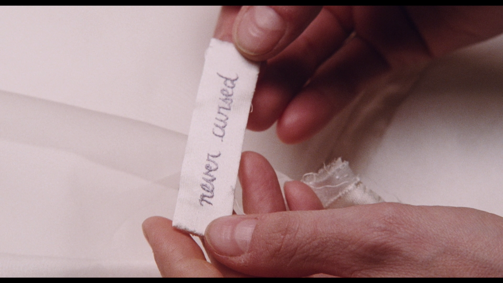 Never Cursed Woven Label | Phantom Thread